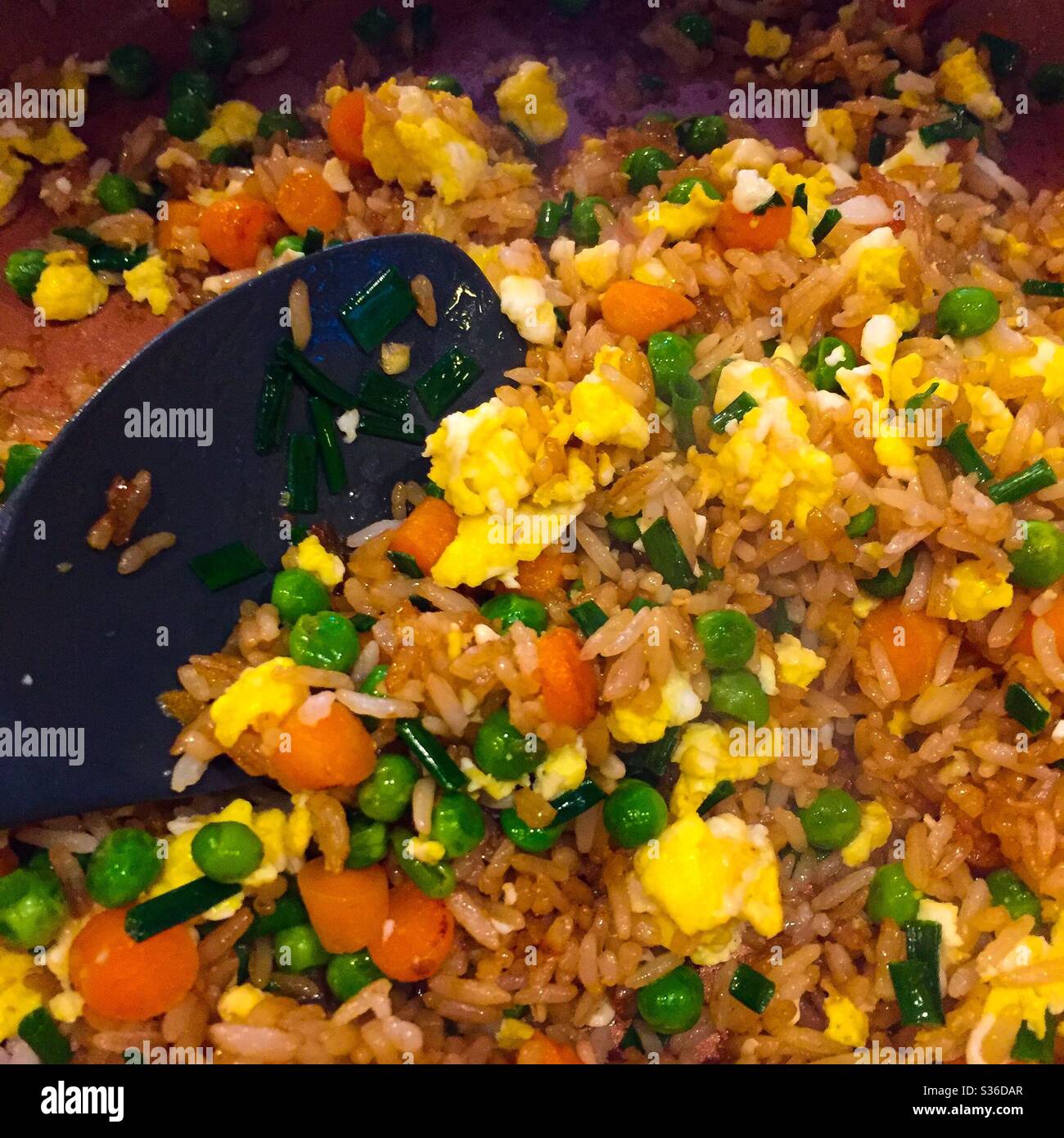 Making vegetable fried rice. Stock Photo
