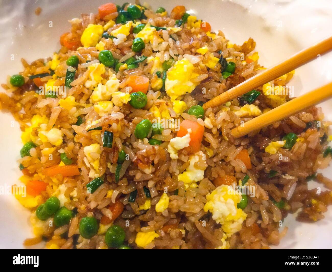 Vegetable fried rice and chopsticks. Stock Photo