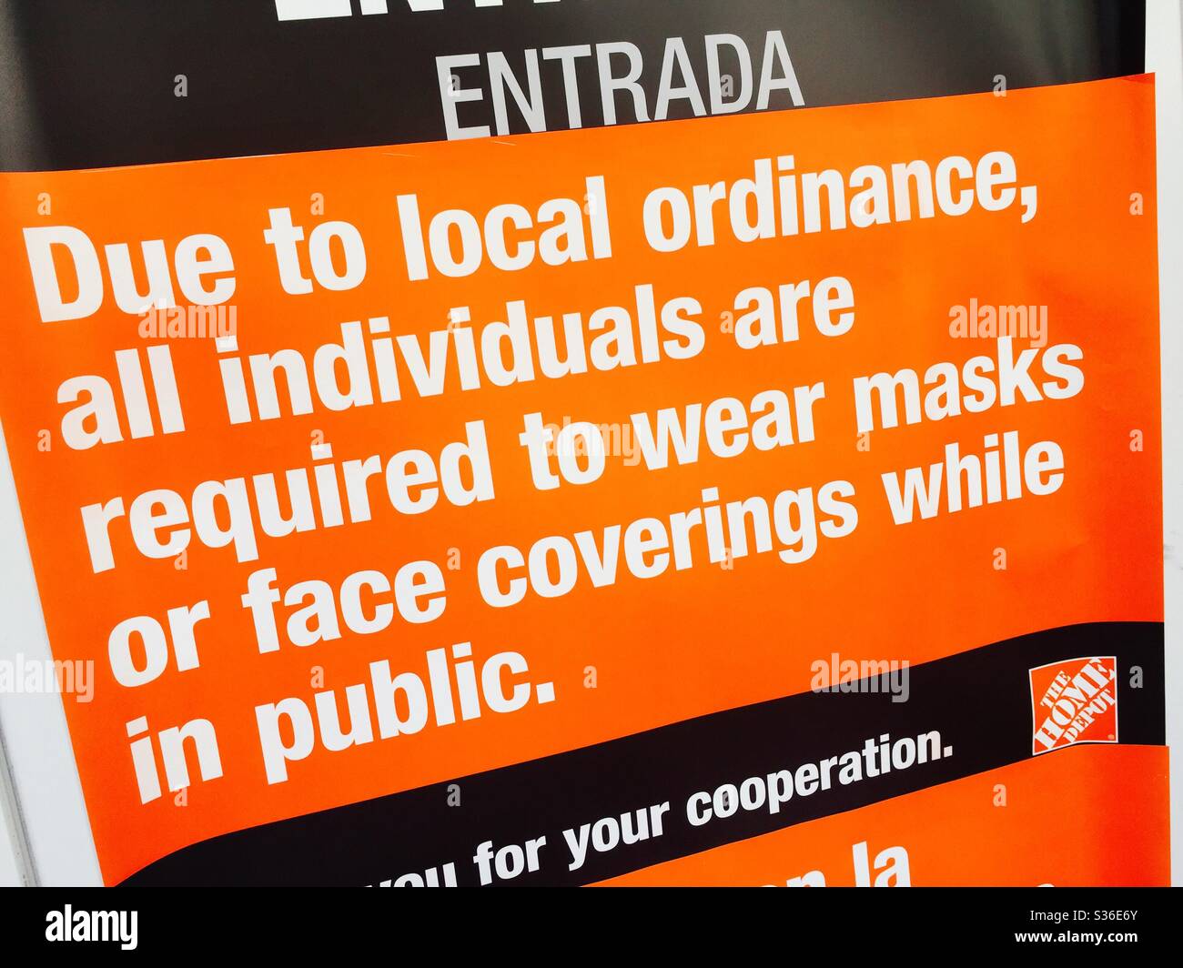 Local ordinance social distancing and protection sign at the entrance to Home Depot in New York City during the coronavirus pandemic, 2020, USA - Smartphone Captured Stock Image