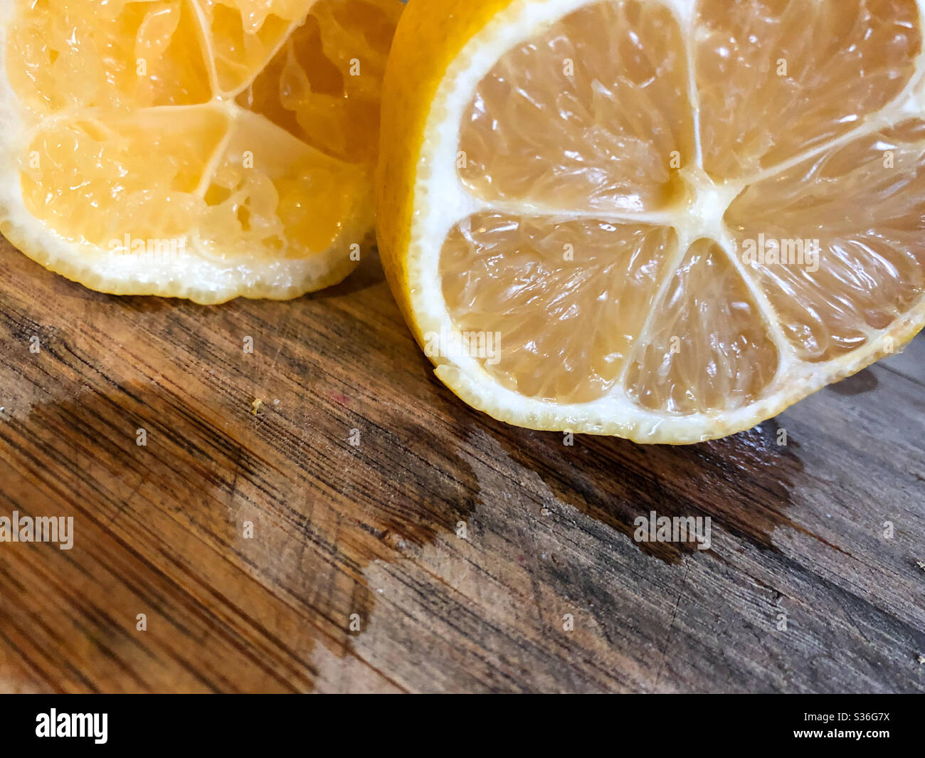 Open lemon on cutting board - Smartphone Captured Stock Image