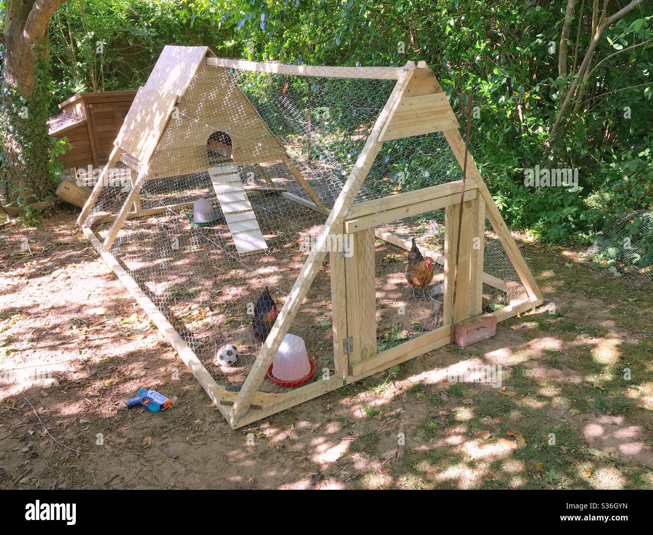 Handmade A-Frame chicken coop. Stock Photo