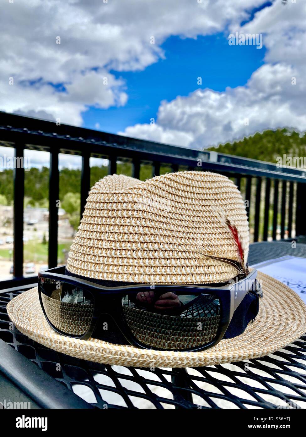 Straw Fedora with sunglasses Stock Photo Alamy