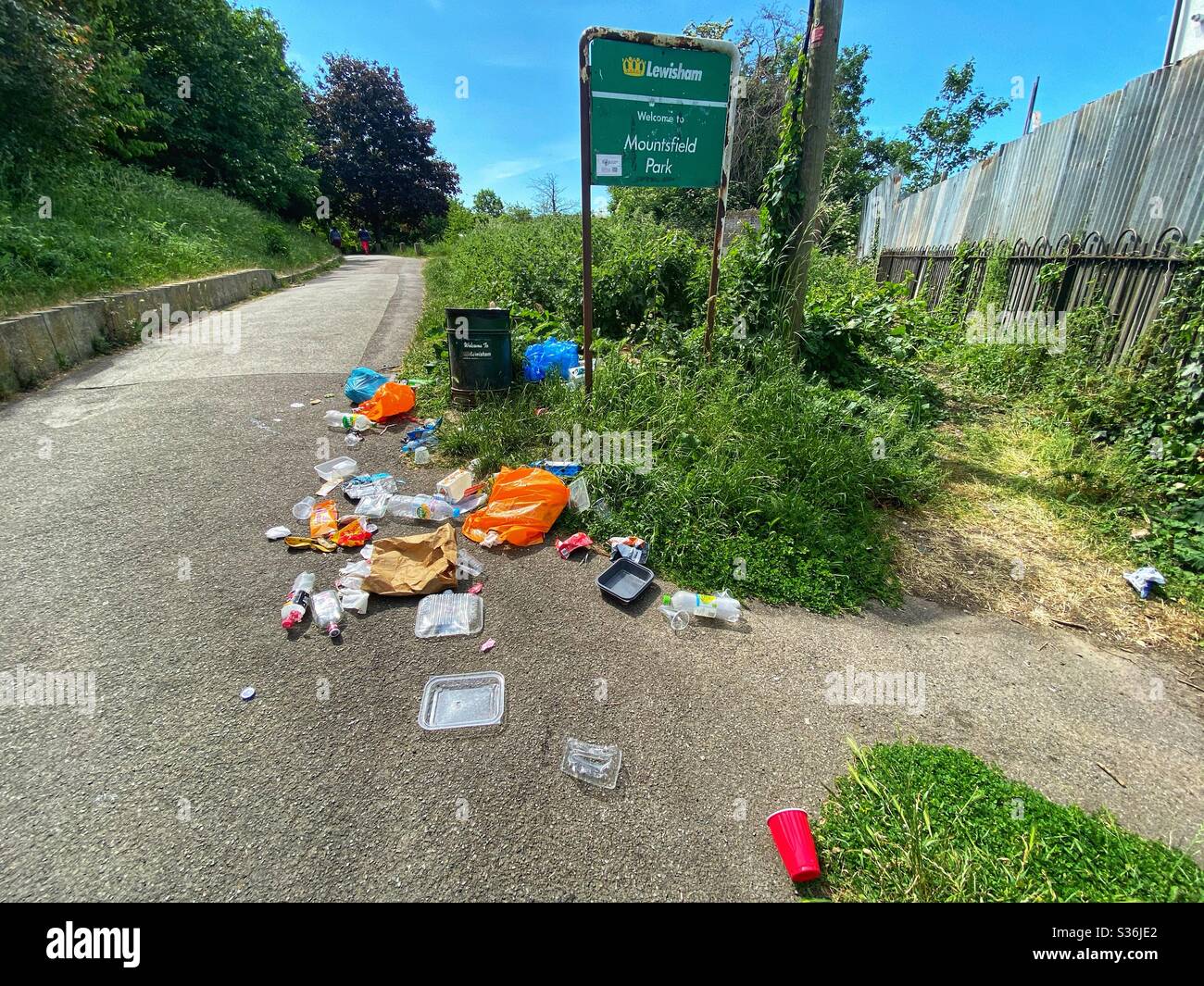 Rubbish is seen in Mountsfield Park after the bank holiday on May 26 in