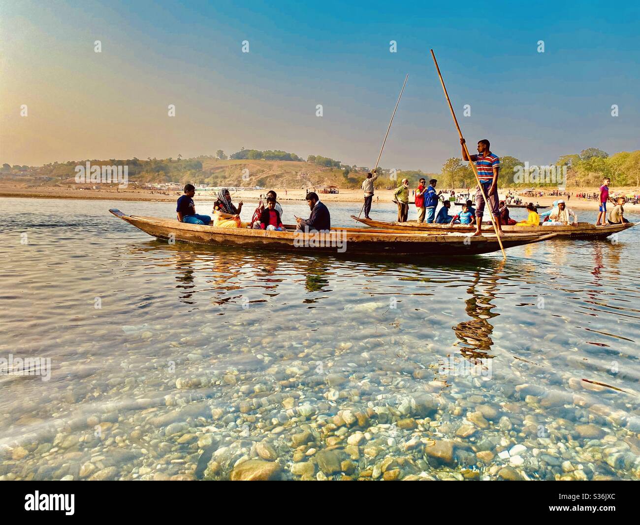 Tourists enjoying their boat ride, Jaflong, Bangladesh Stock Photo