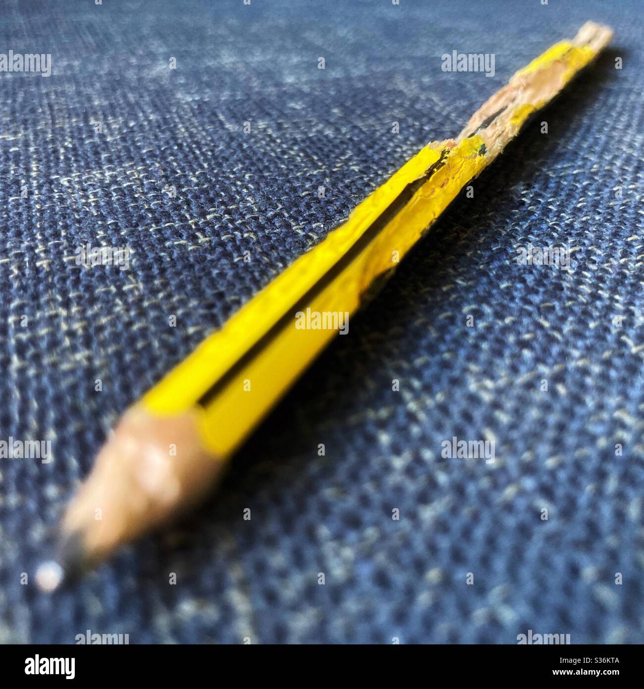 Biting pencil Stock Photo