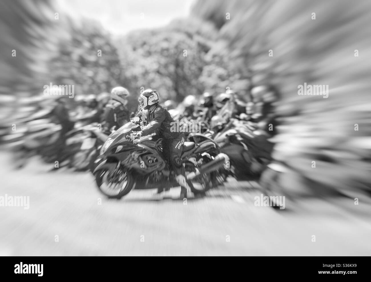motorcycles blur-with grey scale filter Stock Photo