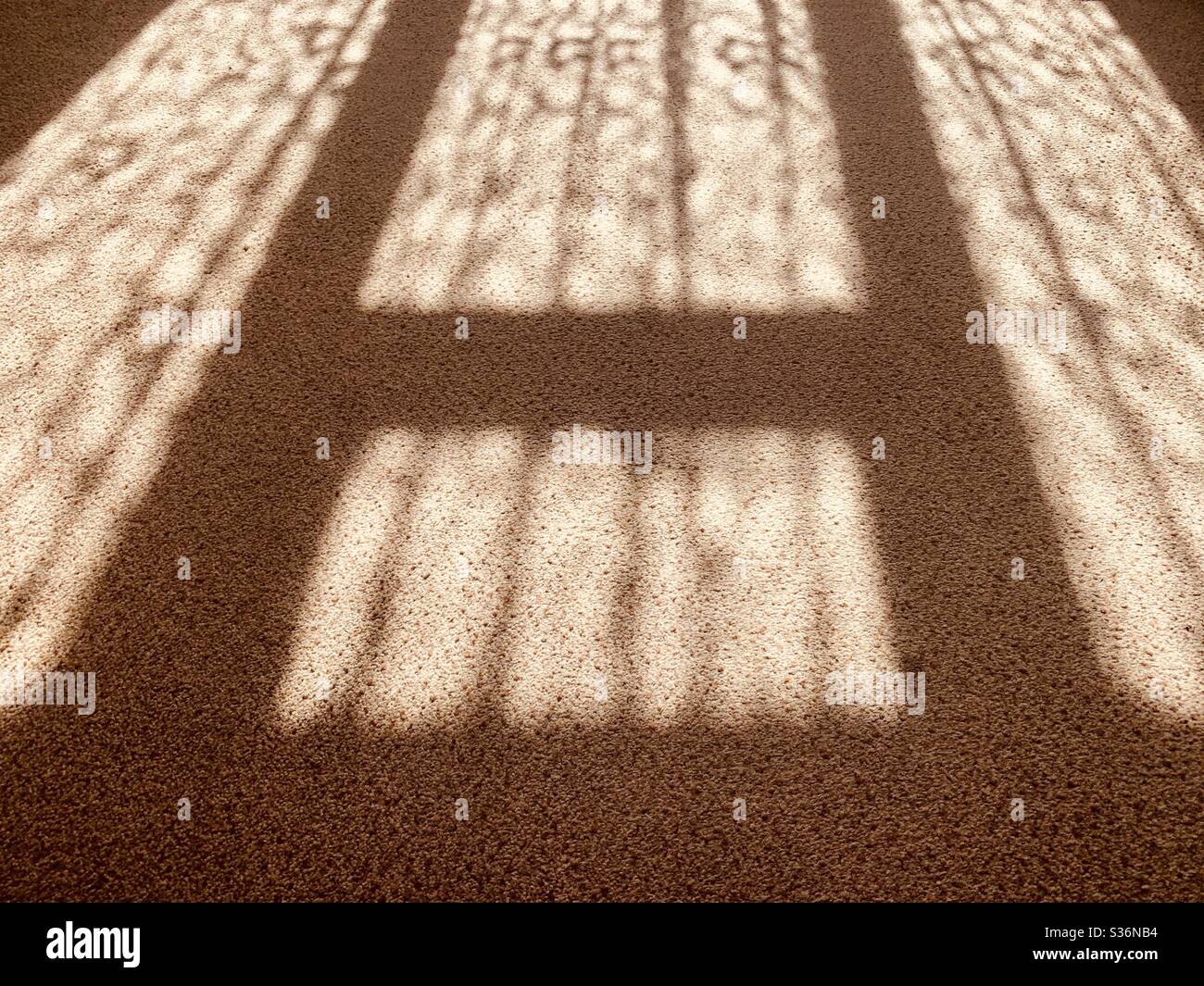 Window shadow on carpet Stock Photo