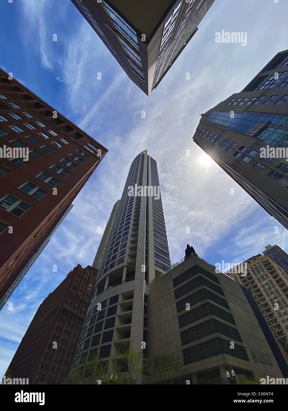 Low wide angle of skyscrapers looking up from below, Chicago, Illinois Stock Photo