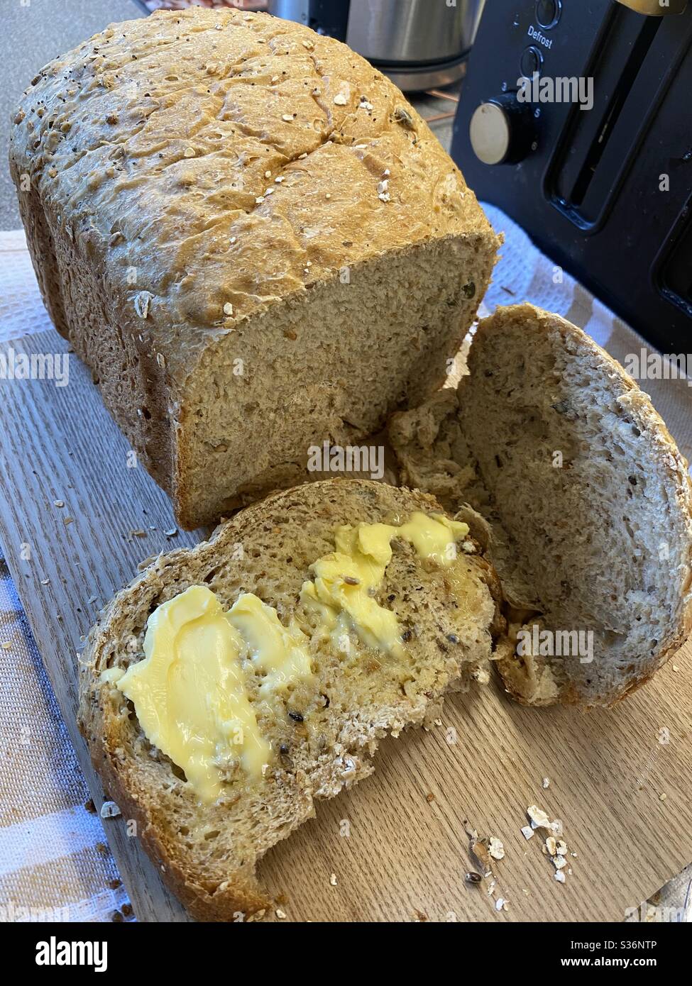 No need to toast this homemade Granary Loaf with real butter. - Smartphone Captured Stock Image