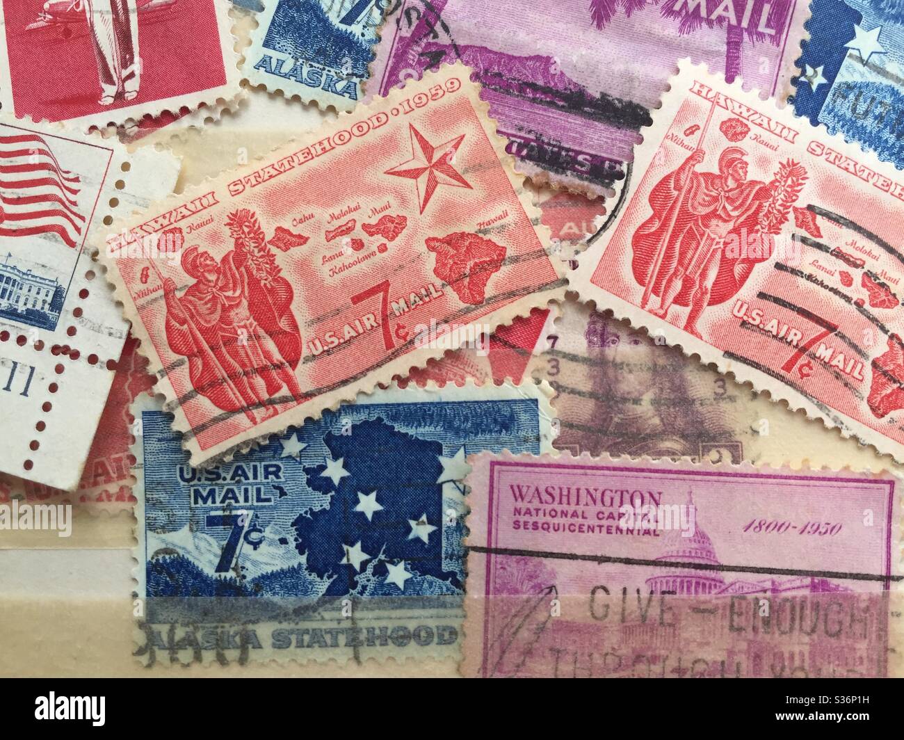 Close up of US commemorative stamps in a stamp collectors stock book