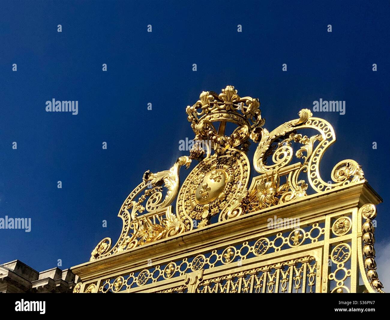 The golden gates at Versailles Stock Photo Alamy