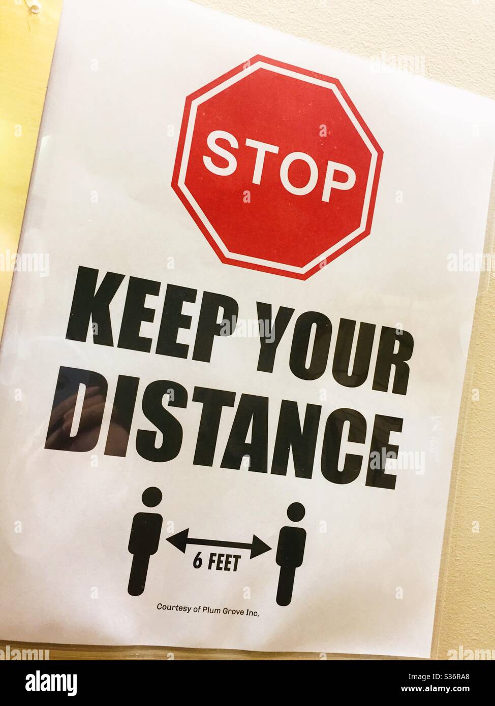 A social distancing reminder sign during the coronavirus epidemic, NYC, USA - Smartphone Captured Stock Image