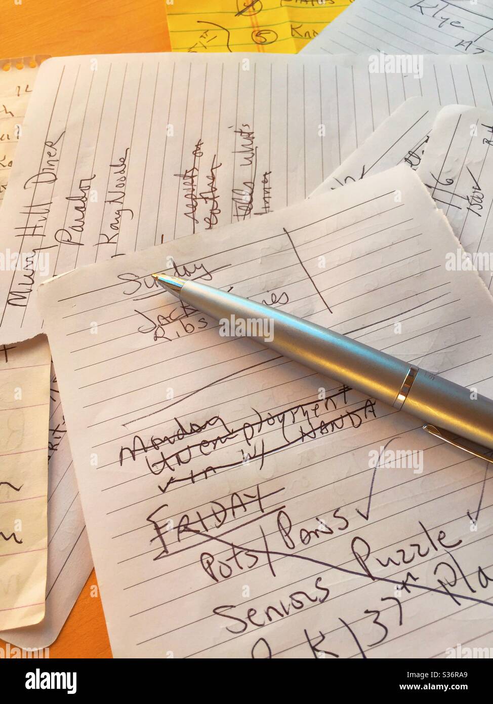 Close up of home to do lists and a ball point pen, USA - Smartphone Captured Stock Image