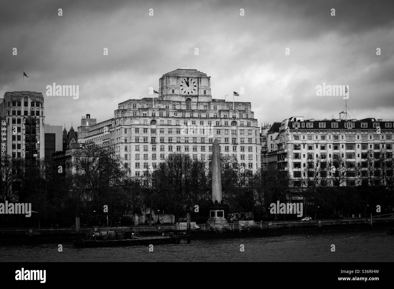 Photo of Shell Mex Building Across River Thames on a cloudy day with Black and White Effect - Smartphone Captured Stock Image