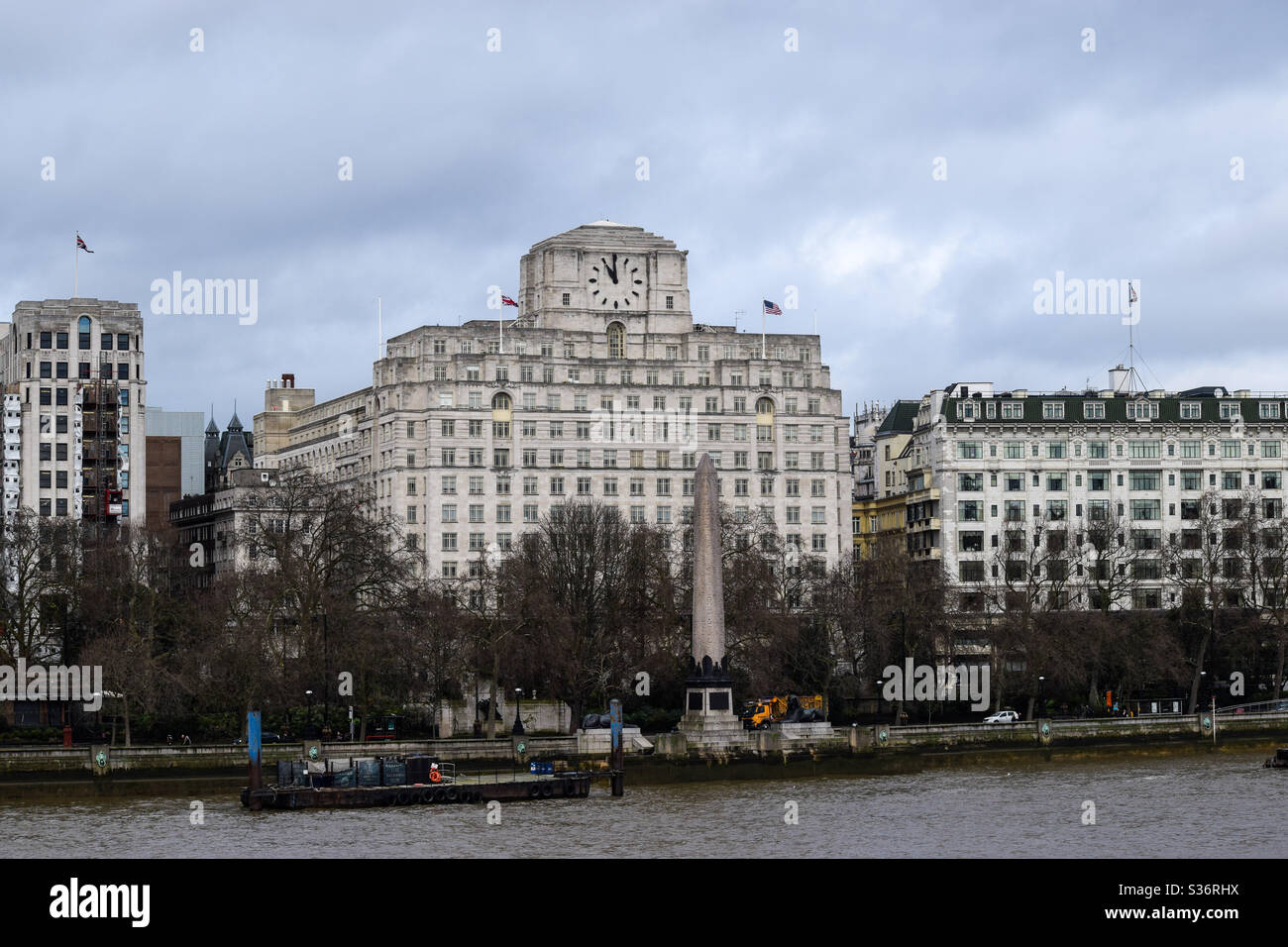 Photo of Shell Mex Building Across River Thames on a cloudy day - Smartphone Captured Stock Image