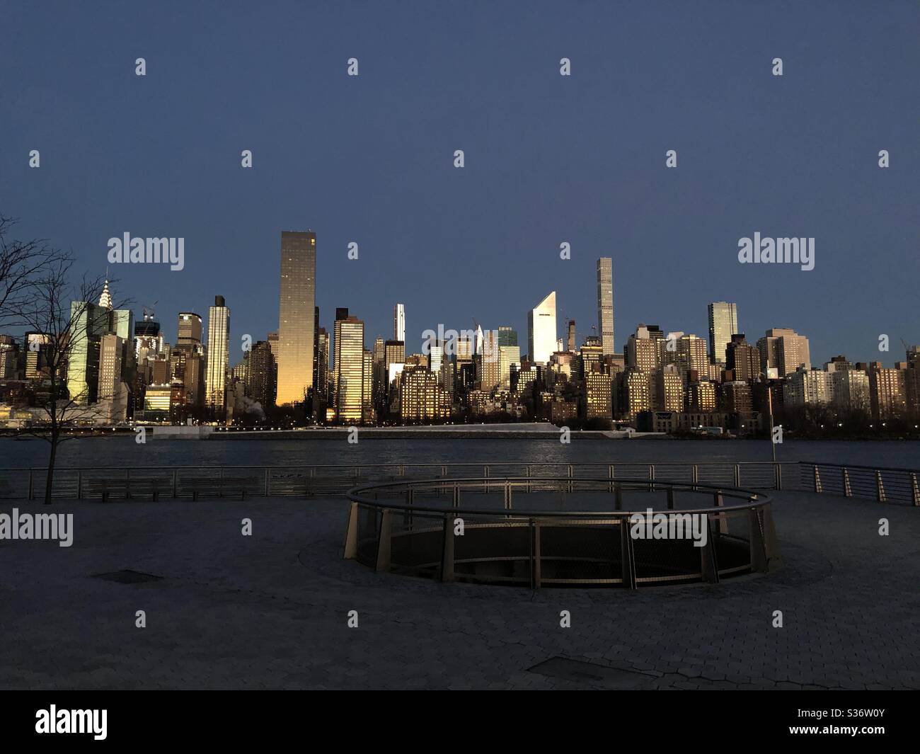 View of Midtown Manhattan at sunrise from Long Island City Stock Photo