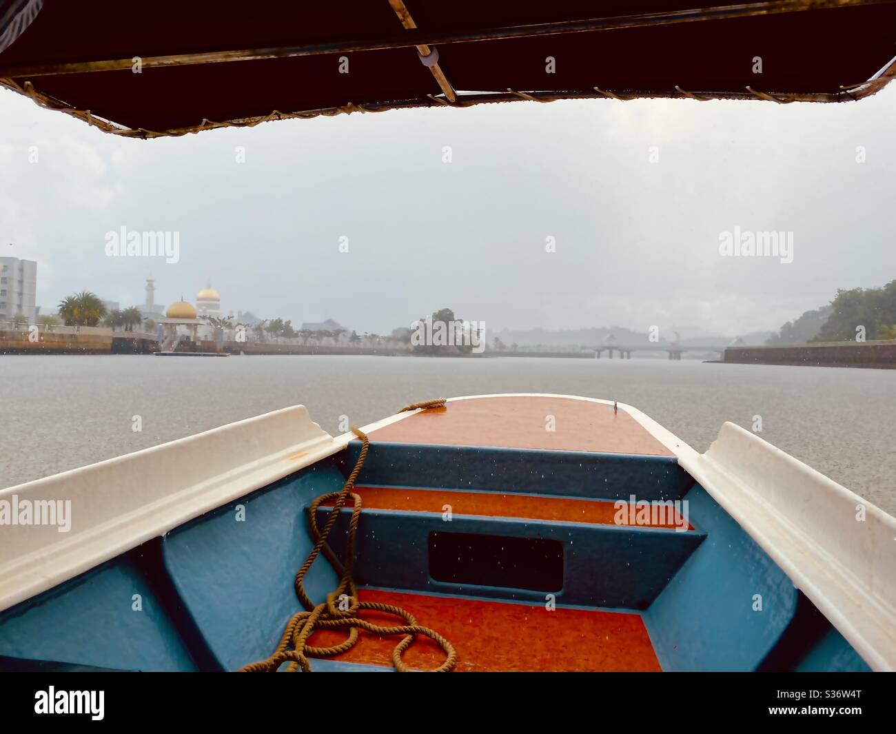 Boat ride in heavy rain Stock Photo Alamy