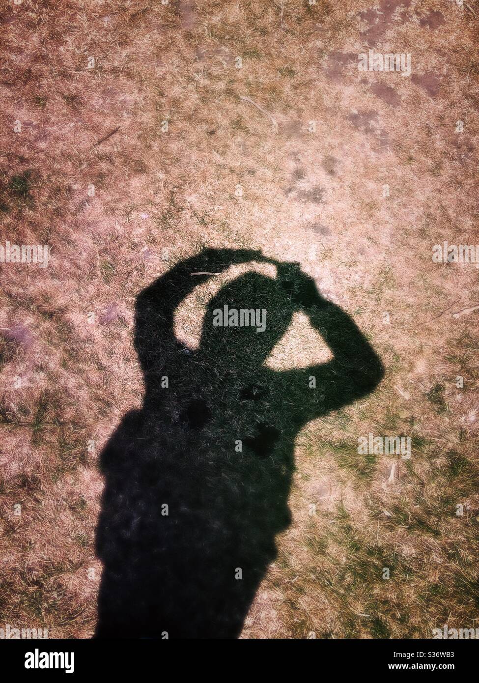 Person’s shadow that looks like a giant eye - Smartphone Captured Stock Image