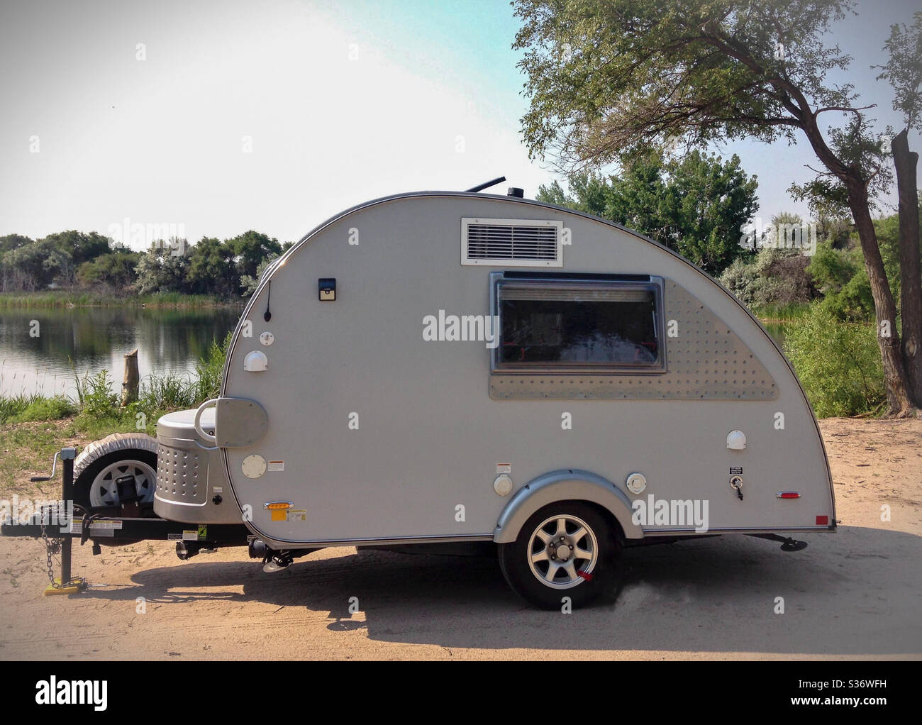 Teardrop camper by a Lake in Nebraska Stock Photo Alamy