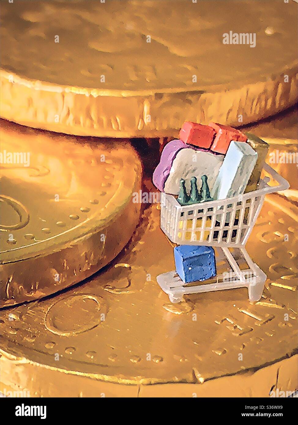 Price of shopping.  Shopping trolley or cart on money coin.  Inflation, taxes, and post-covid 19 coronavirus cost of living.  Food prices.  Interest rates.  Money worries - Smartphone Captured Stock Image