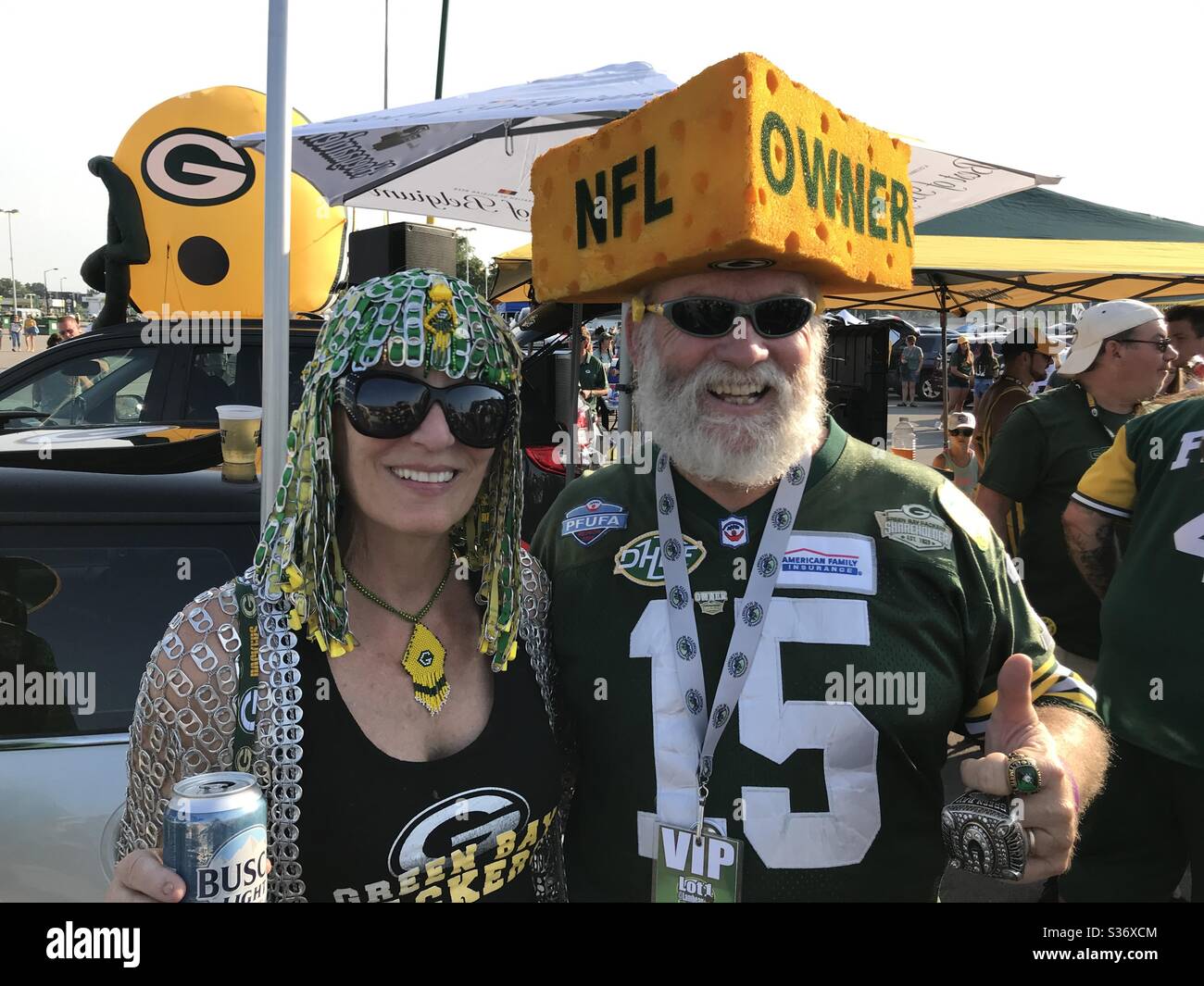 Green Bay, Wisconsin/USA. August 9th, 2018. Two Packer fans tailgate before a football game in the Lambeau Field parking lot. Stock Photo
