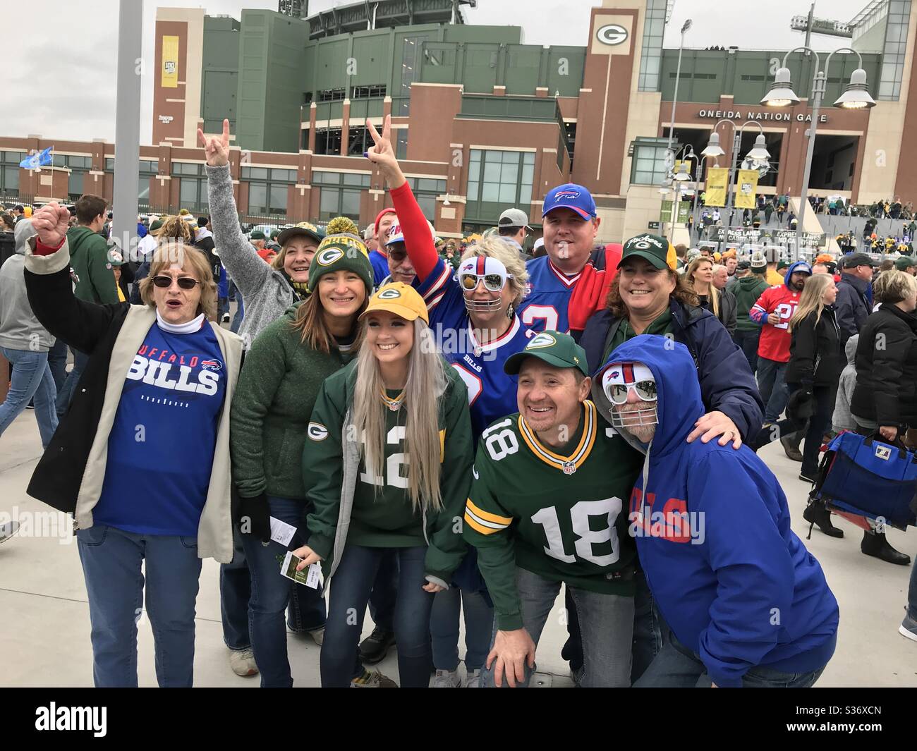 Green Bay, Wisconsin/USA. September 30, 2018. A group of football fans for the Packers and Bills gather in the parking lot of Lambeau Field before a game. Stock Photo