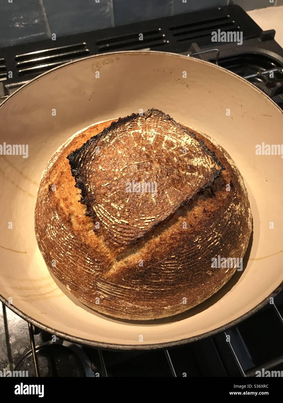 Sourdough bread baked in a cast iron casserole dish Stock Photo Alamy