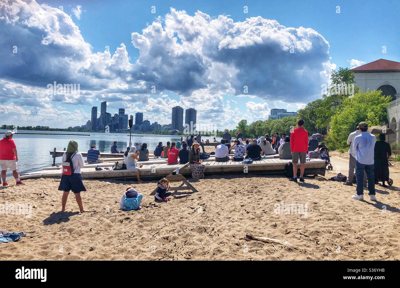 An outdoor church service on the beach of Lake Ontario in Toronto. - Smartphone Captured Stock Image