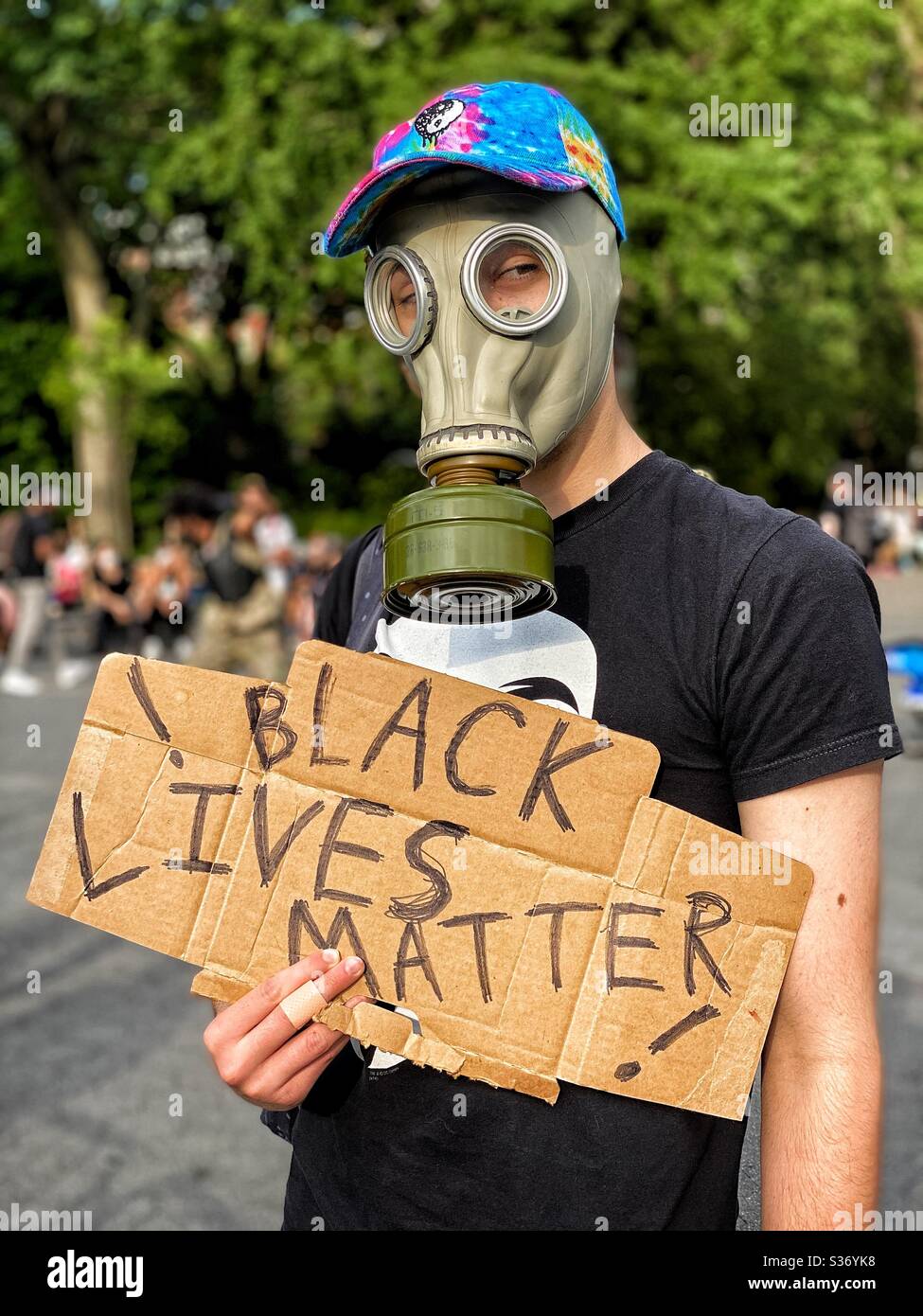 A protester holds a Black Lives Matter sign at a rally in New York City. Stock Photo