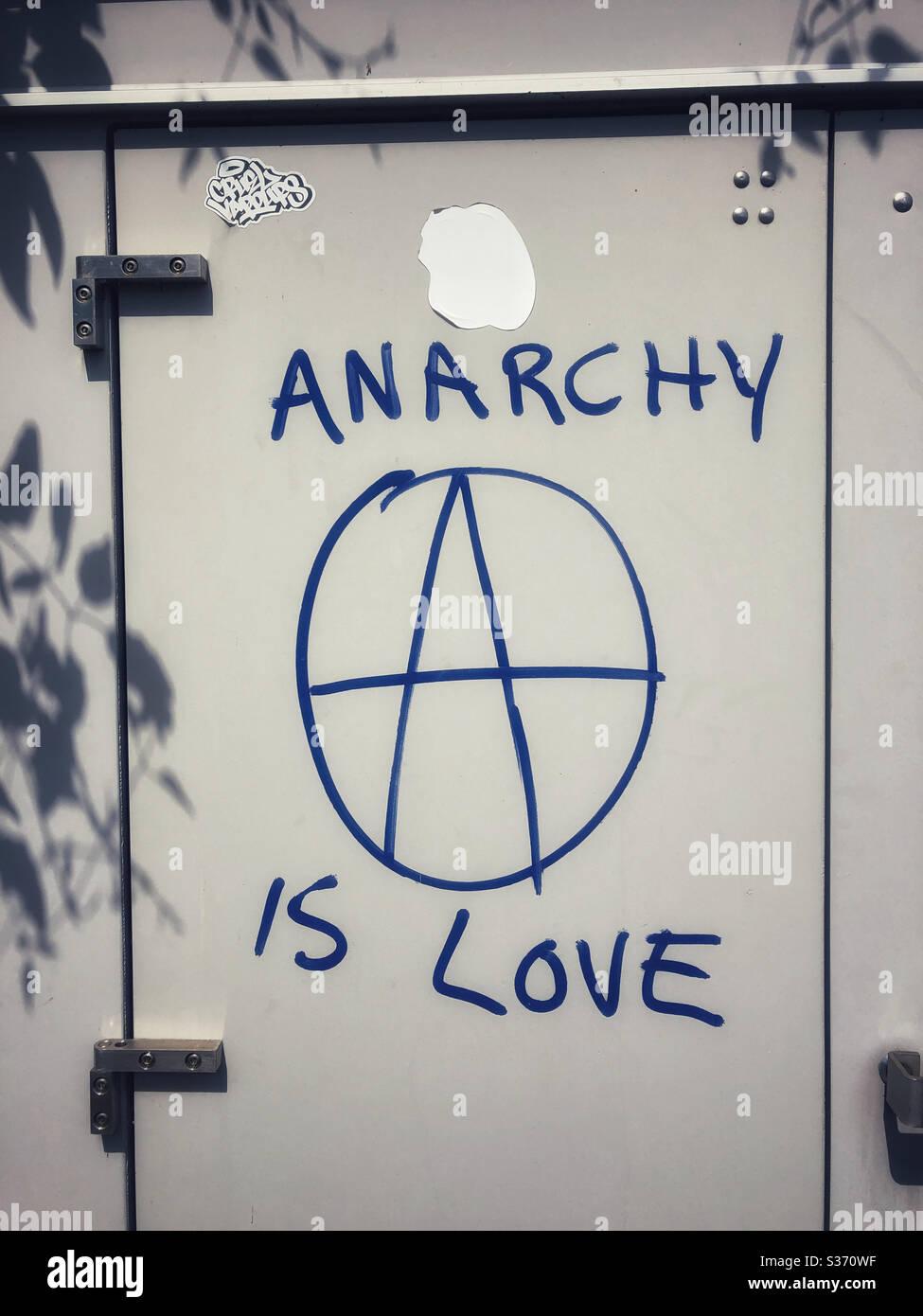 Graffiti on a wall -Anarchy is love Stock Photo