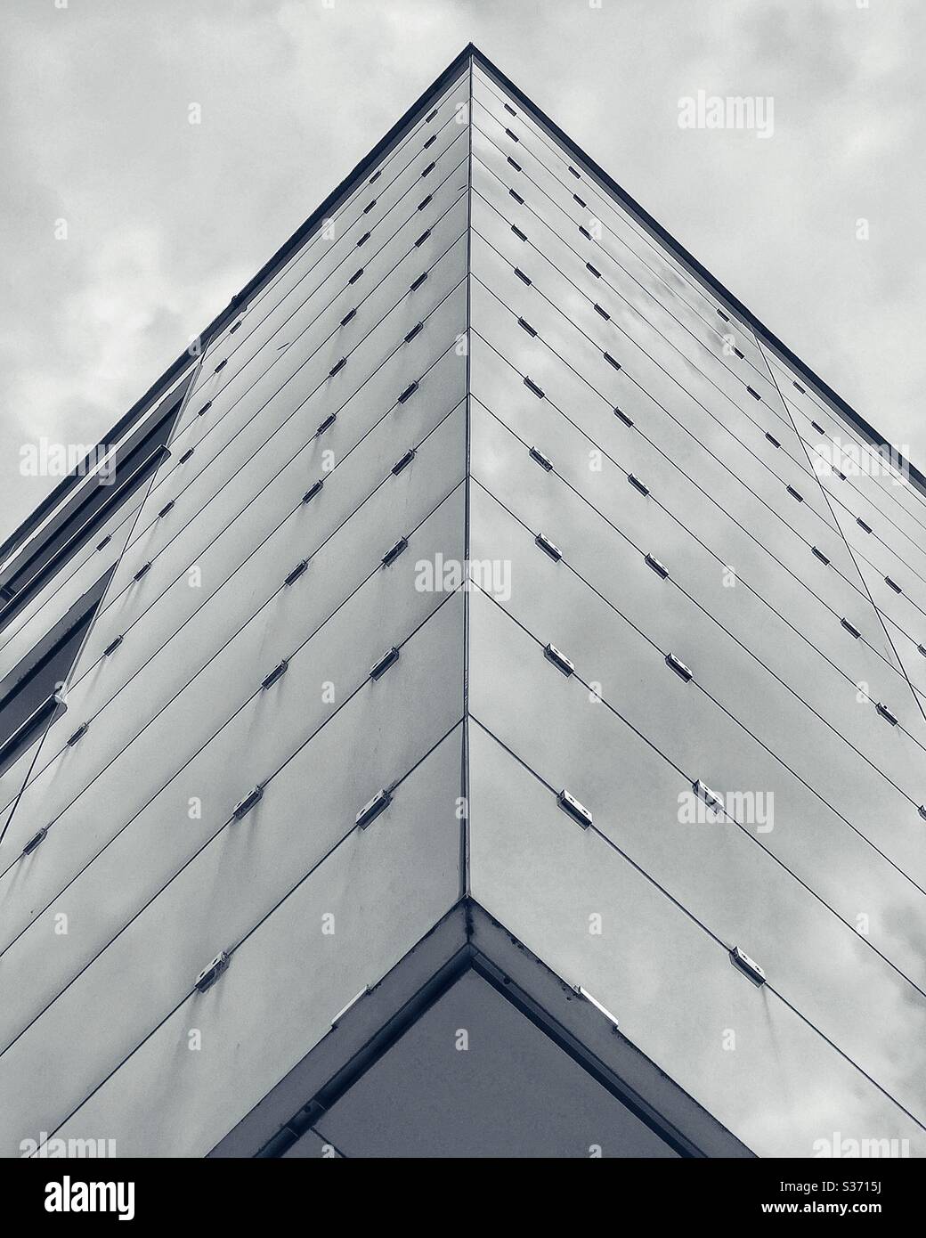 Modern building with reflective metallic facade - Smartphone Captured Stock Image