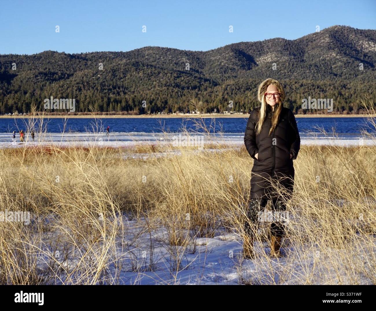 Woman by the Lake.  Big Bear Lake CA 2018 Stock Photo