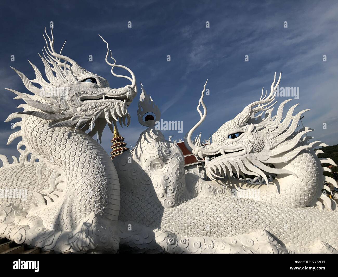 Thai Art: Beautiful White Thai Dragons, Wat Rong Khun, Chiang Rai, Thailand Stock Photo