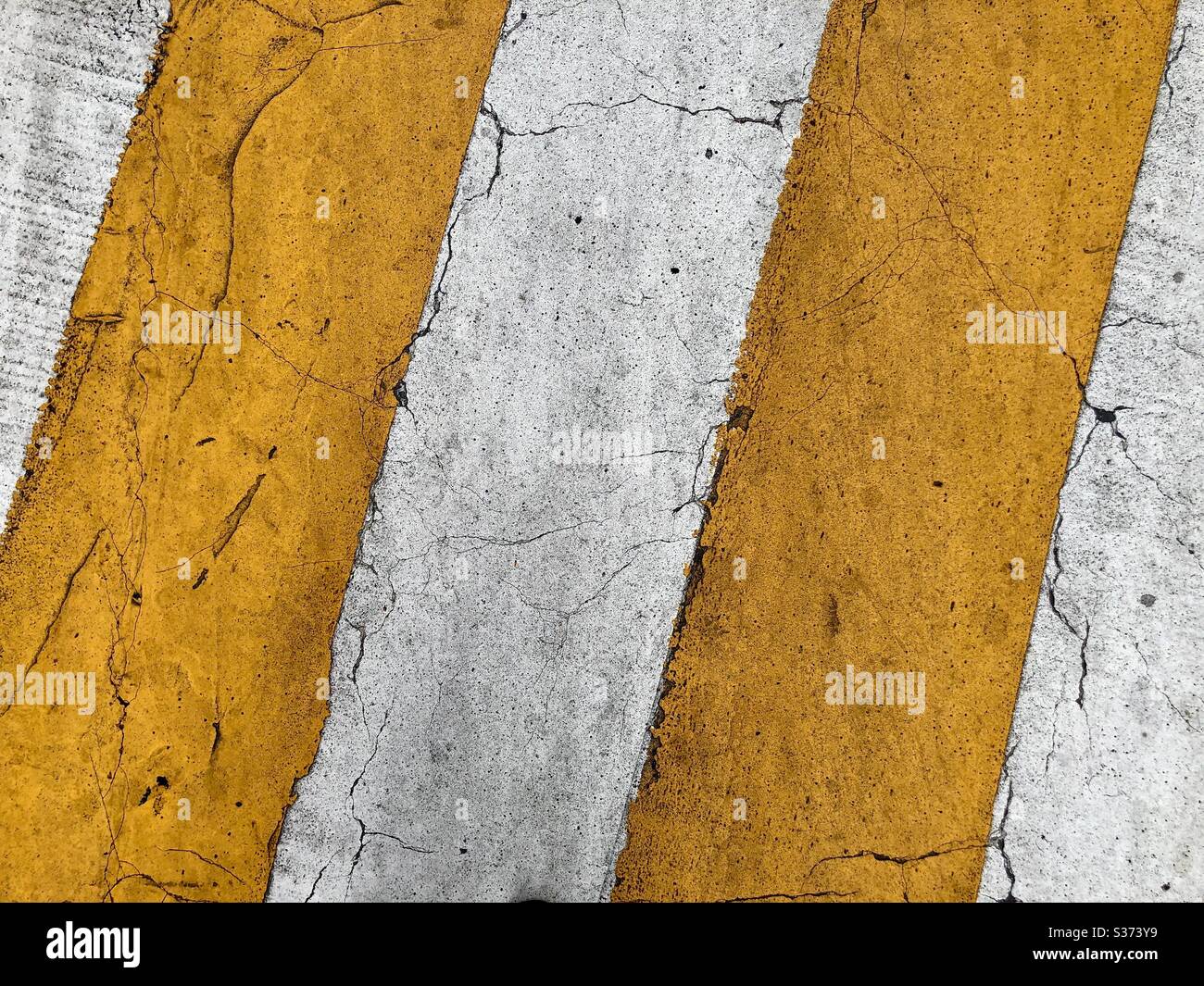 CAUTION yellow and white lines Stock Photo Alamy