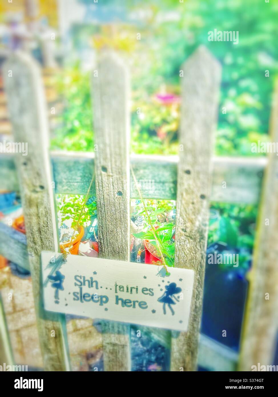 Garden gate with a fairy message. - Smartphone Captured Stock Image