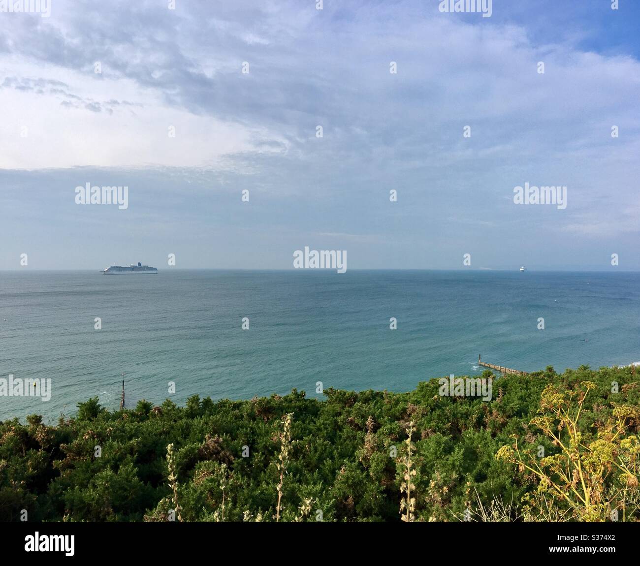 Two P & O Cruise Ships anchored in Bournemouth Bay during the Coronavirus epidemic June 2020 seen from the clifftops at Southbourne Stock Photo