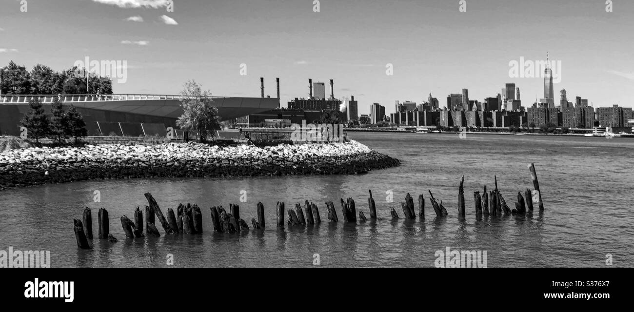 Black and white Skyline of Gantry State park and East Village Manhattan seen from the East River, New York, United States of America - Smartphone Captured Stock Image