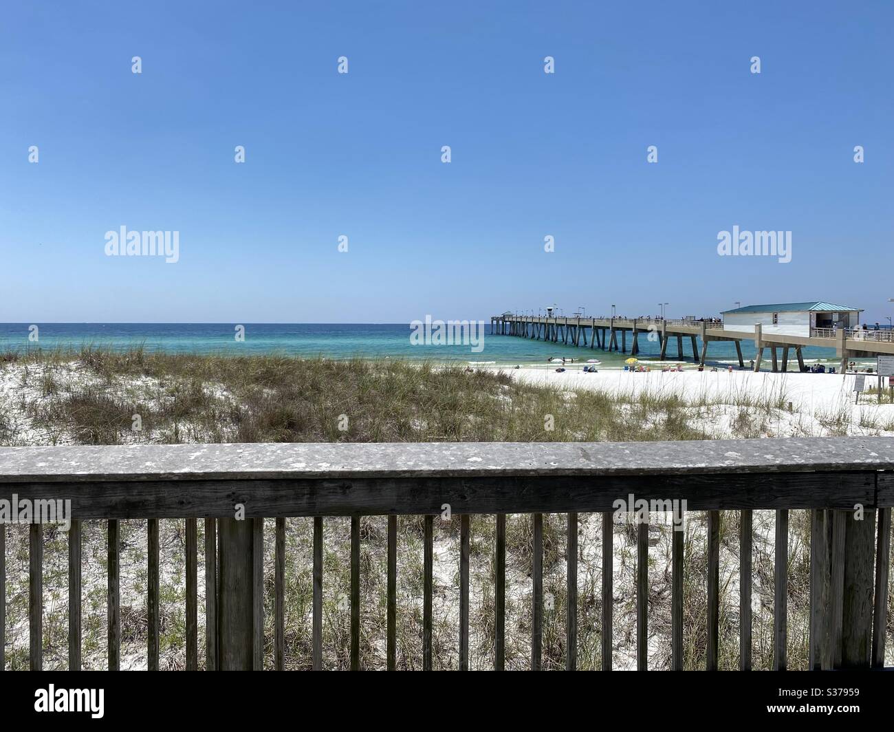 Upper view of public fishing pier at Okaloosa Island Florida - Smartphone Captured Stock Image