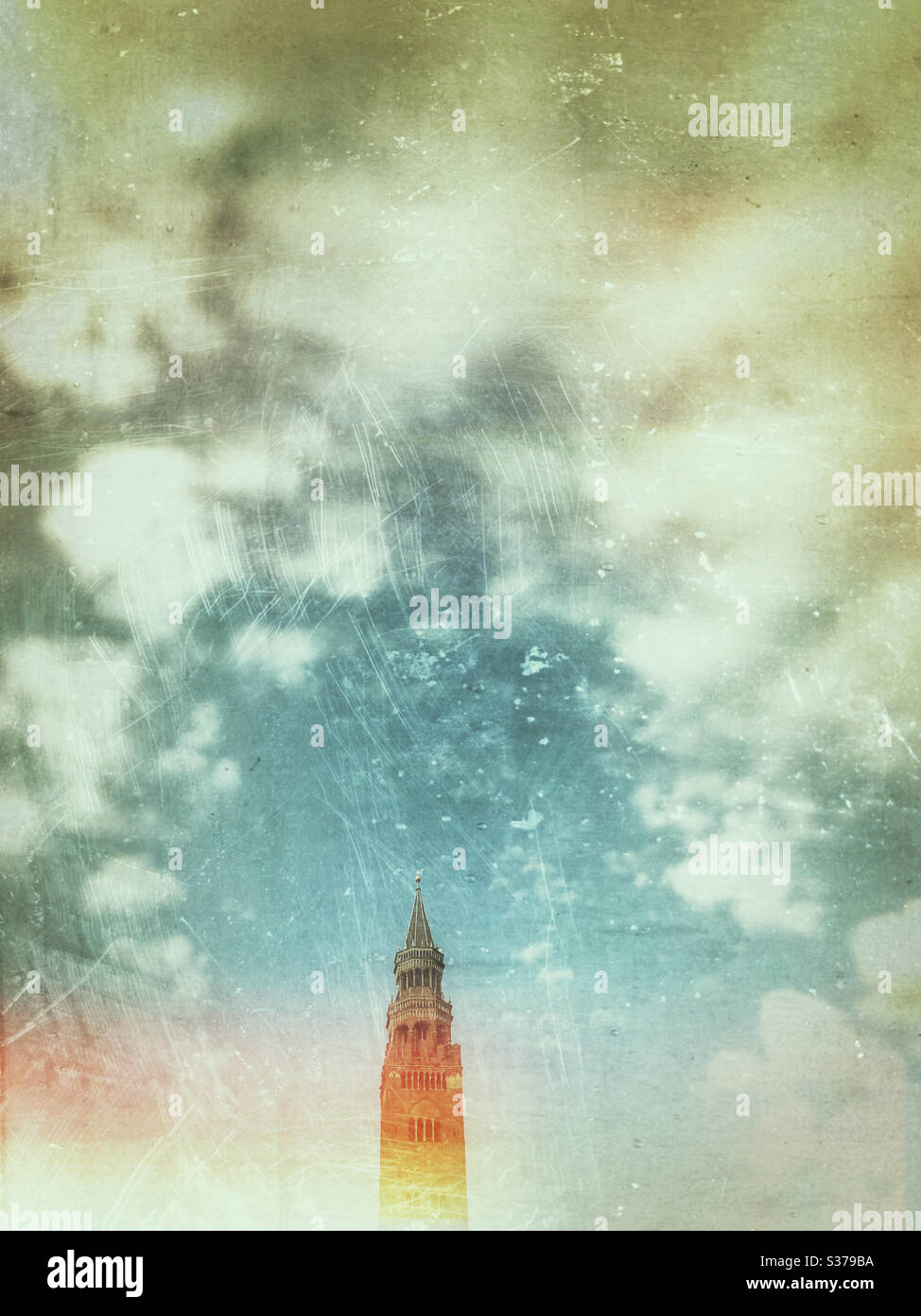 Torrazzo tallest brick tower in Europe in Cremona Italy isolated sky around - Smartphone Captured Stock Image