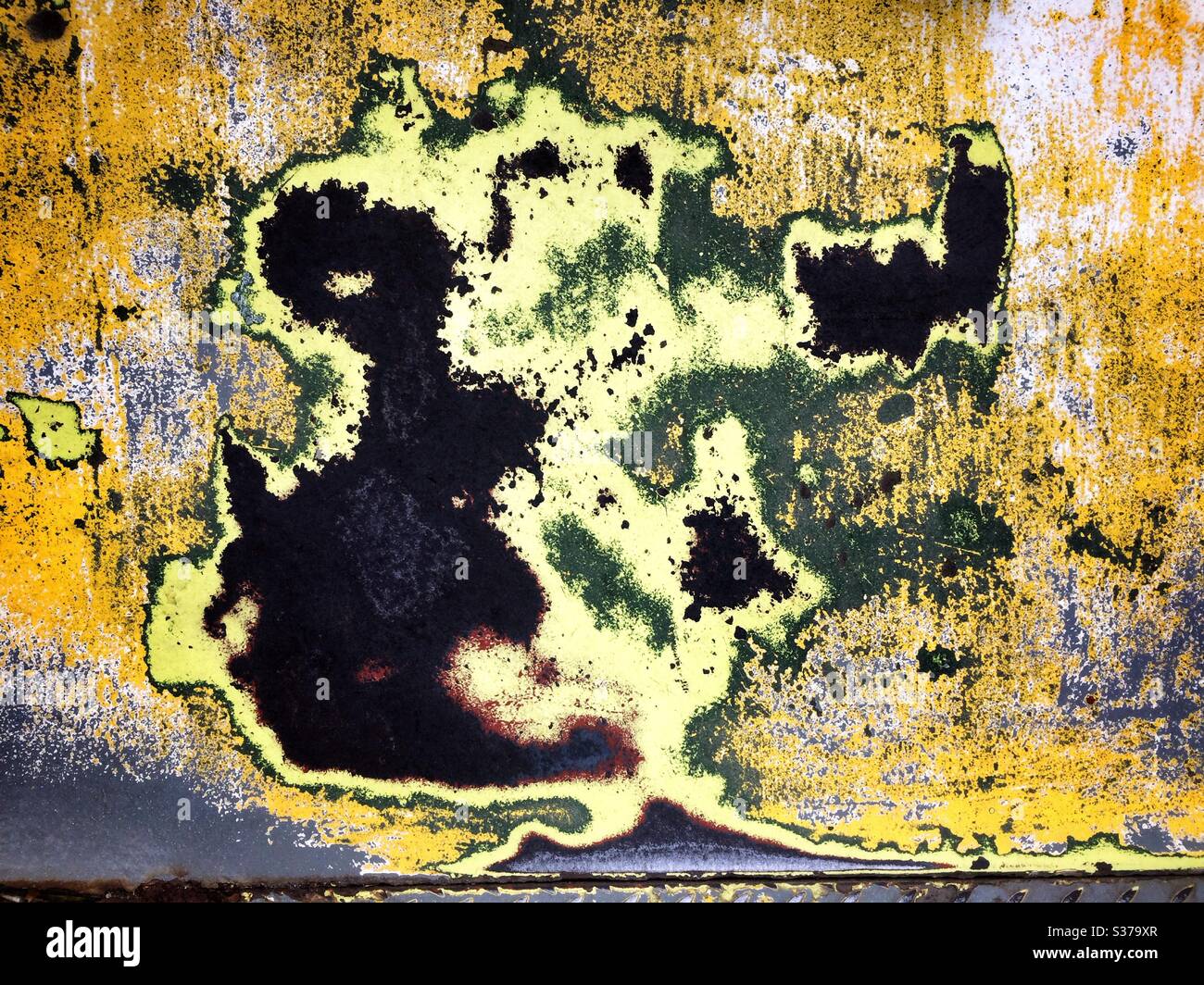 Texture pattern - weathered steel surface with corrosion and different coloured paint layers - Smartphone Captured Stock Image