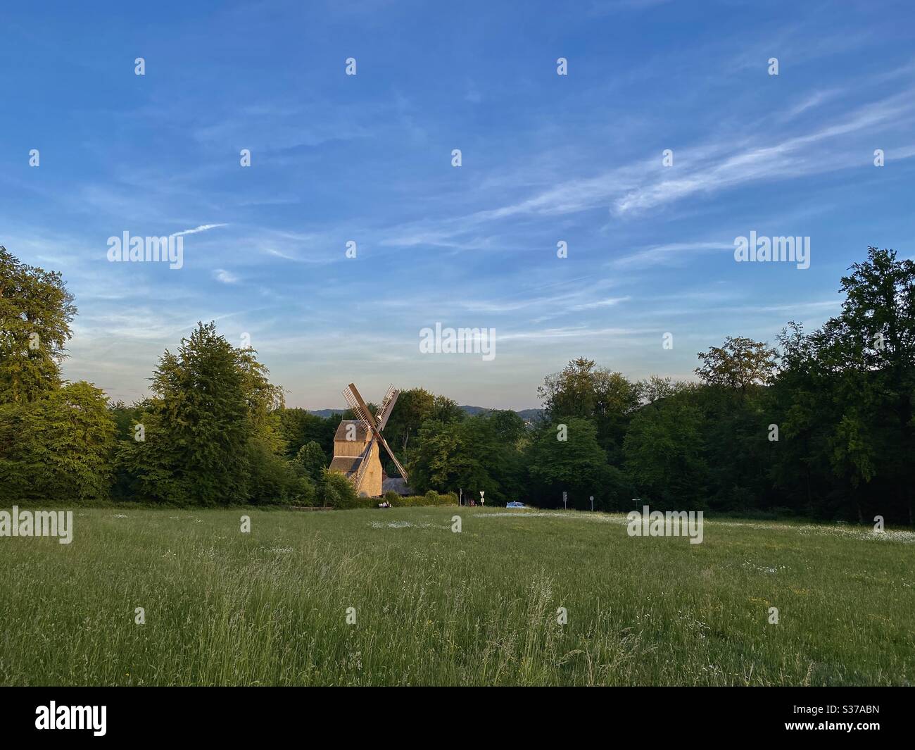 Old wind mill in forest in Bielefeld, Germany Stock Photo