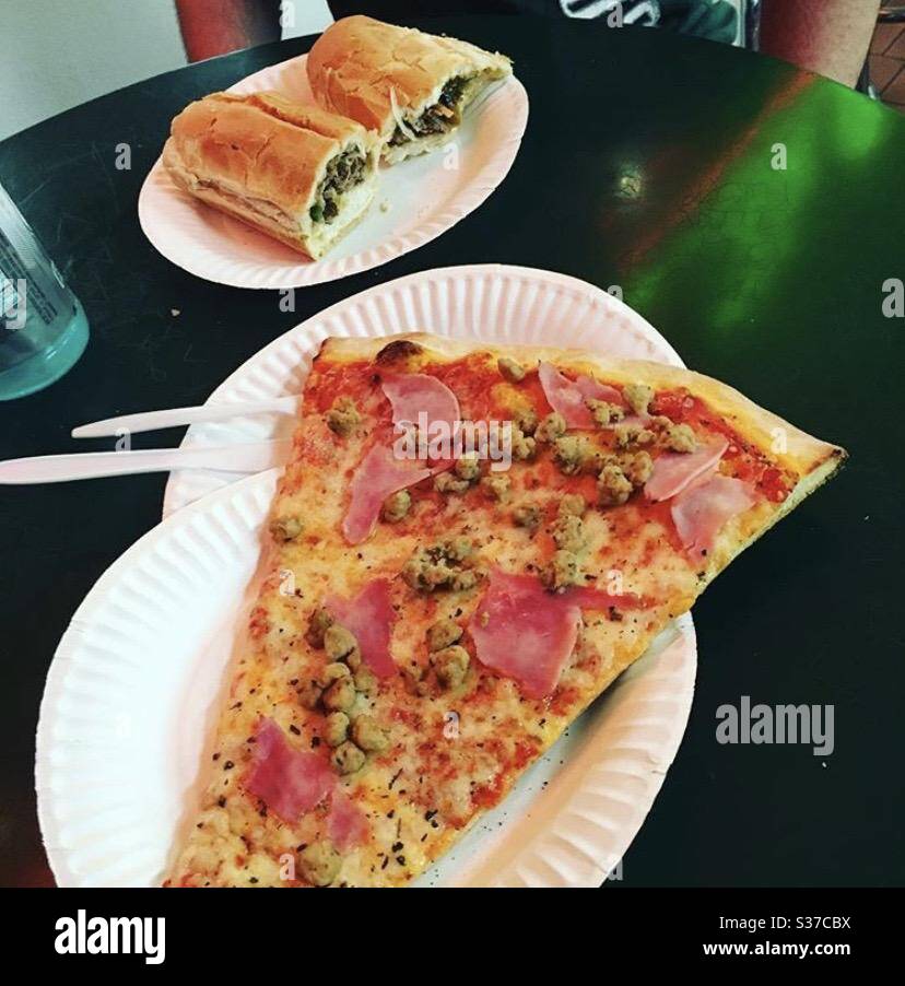 Eating pizza in Hollywood calico Stock Photo Alamy