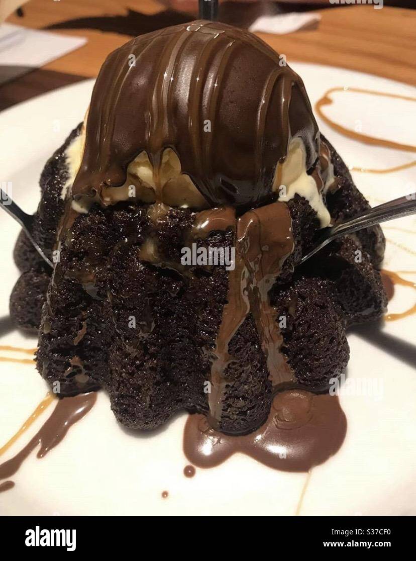 Chocolate lava cake with vanilla ice cream Stock Photo Alamy