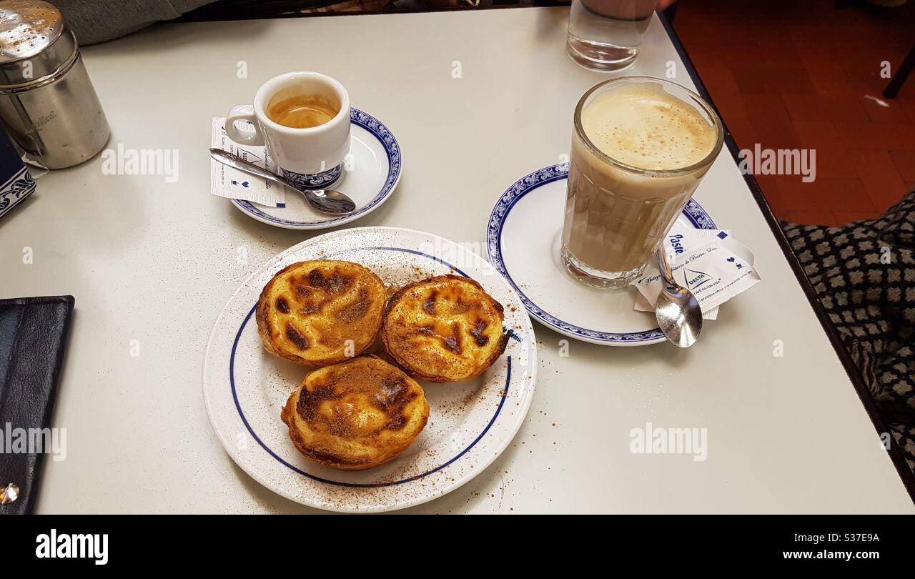 Espresso and pastel de nata in Lisbon, Portugal Stock Photo - Alamy