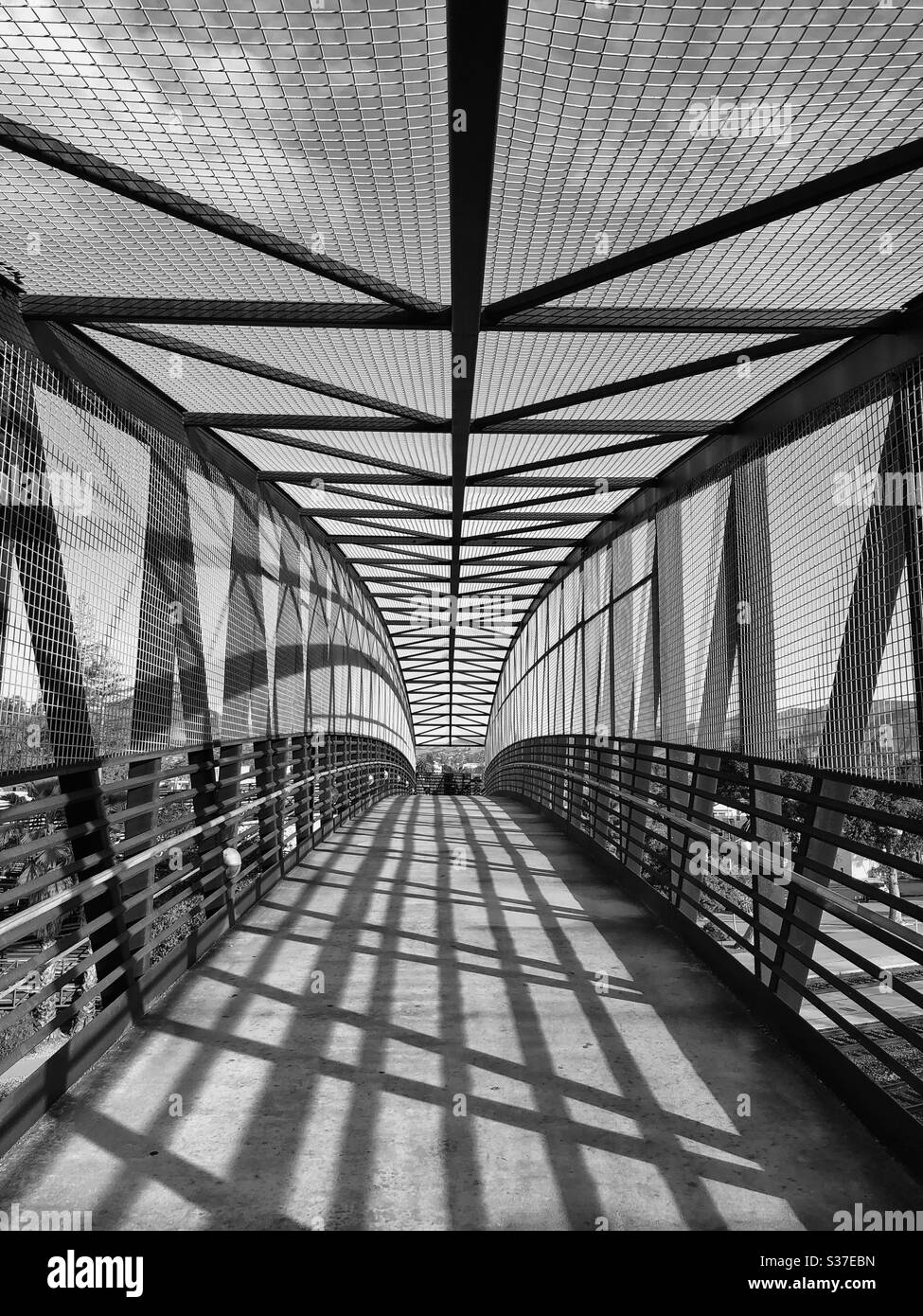 Black and white bridge with shadows and patterns Stock Photo