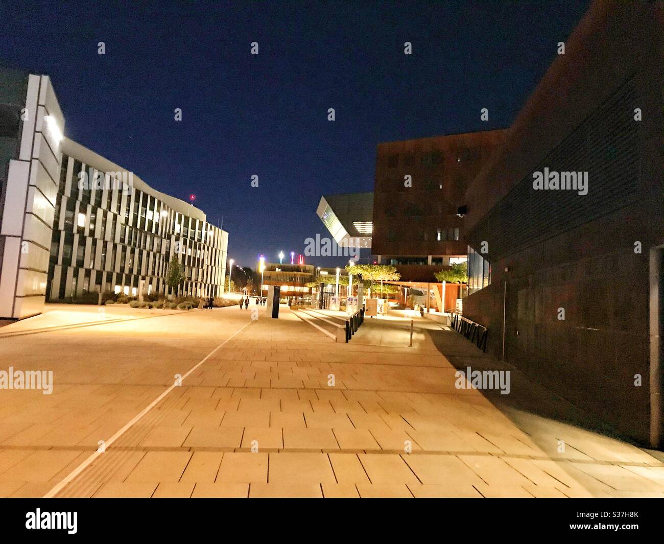 Vienna University of Economics and Business (WU Wien) campus at night Stock Photo