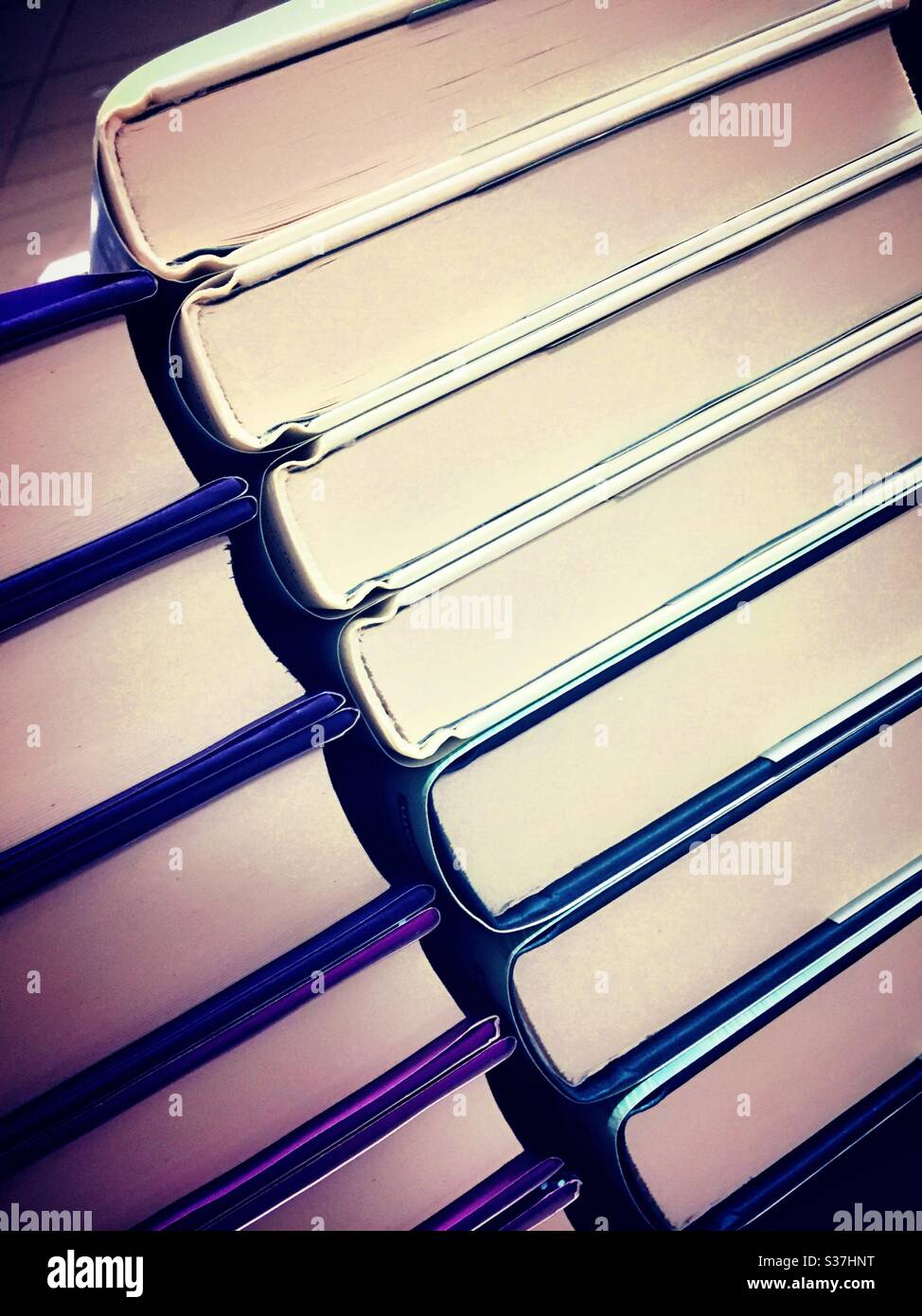 Close up of a stack of hardbound books for sale in a bookstore - Smartphone Captured Stock Image