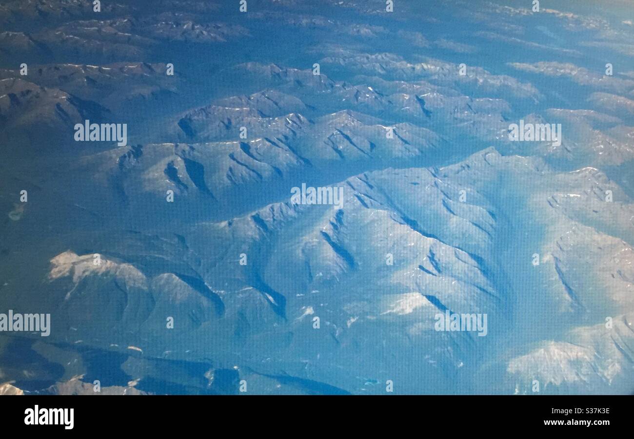 Aerial photography, Canadian Rockies, mountains, Rocky Mountains, Rugged ,jagged, back country, steep, peaks, valleys - Smartphone Captured Stock Image