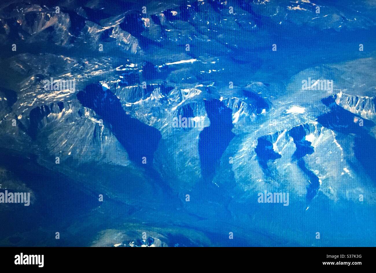 Aerial photography, Canadian Rockies, mountains, Rocky Mountains, Rugged ,jagged, back country, steep, peaks, valleys - Smartphone Captured Stock Image