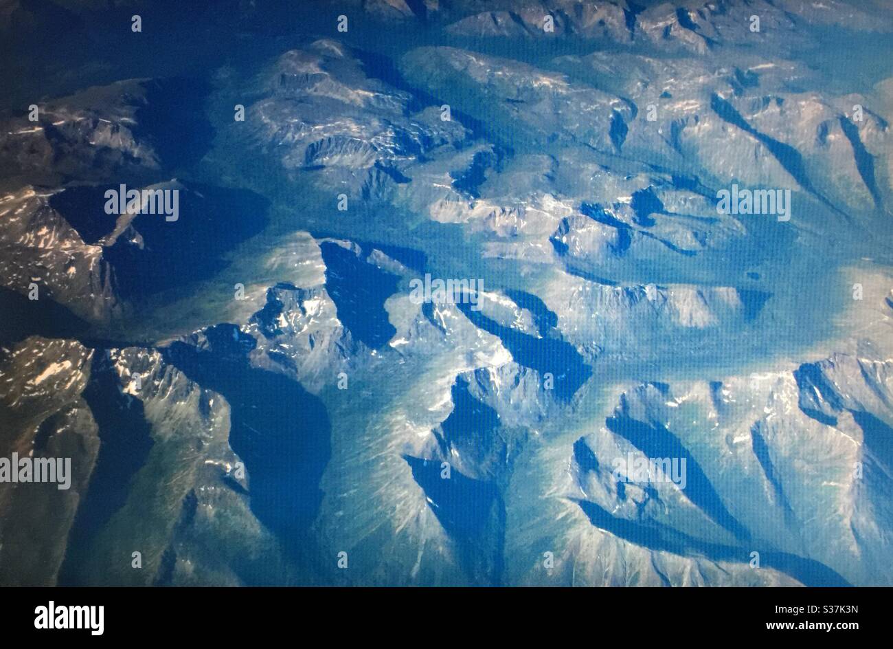 Aerial photography, Canadian Rockies, mountains, Rocky Mountains, Rugged , jagged, back country, steep, peaks, valleys - Smartphone Captured Stock Image